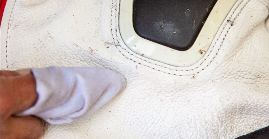 Cleaning the external part of one piece motorbike suit