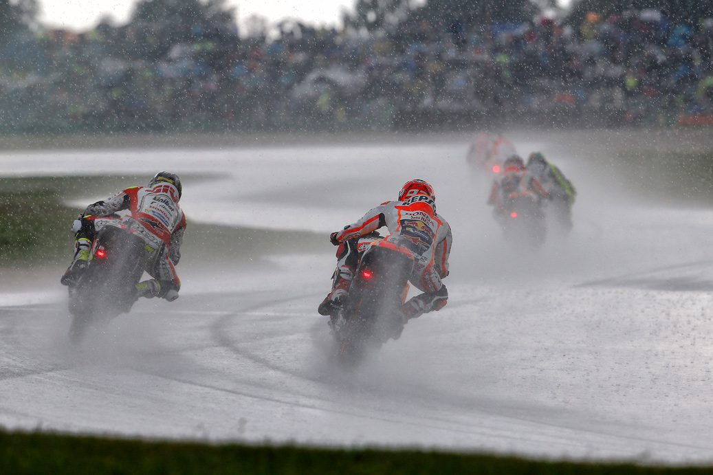 men wearing leather motorbike suits in rain