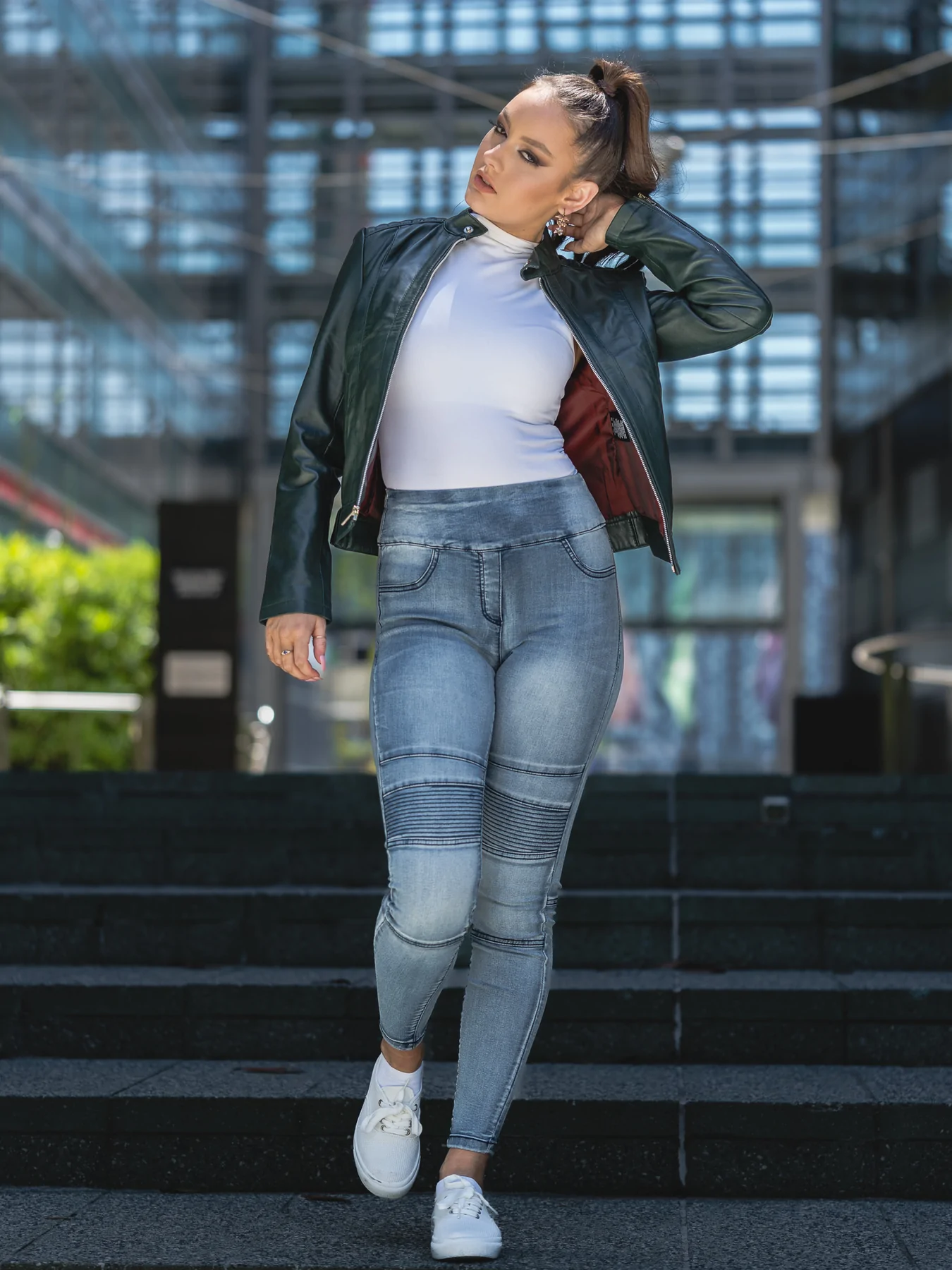 woman styling with the green leather jacket