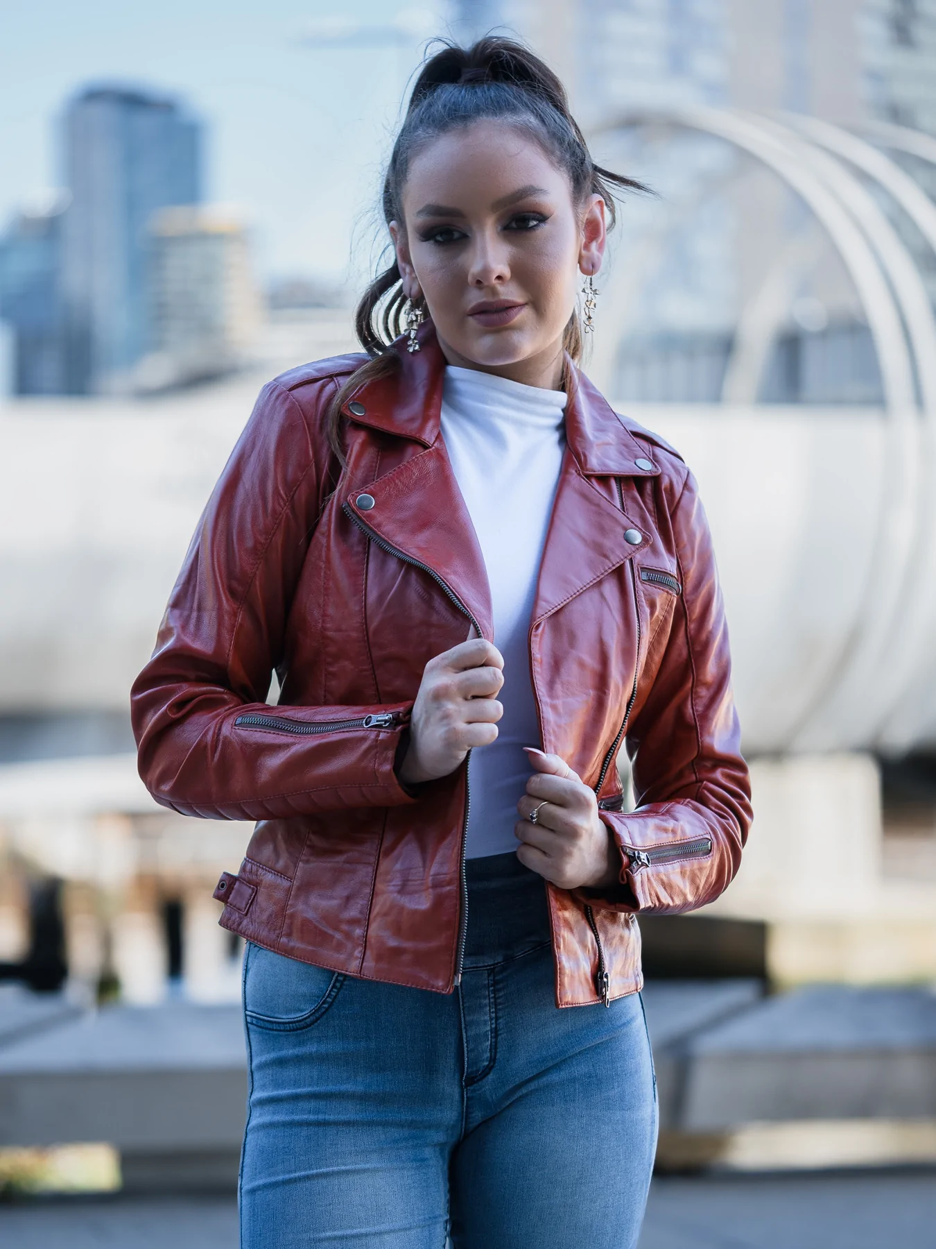 Front open look of dark red leather jacket for women