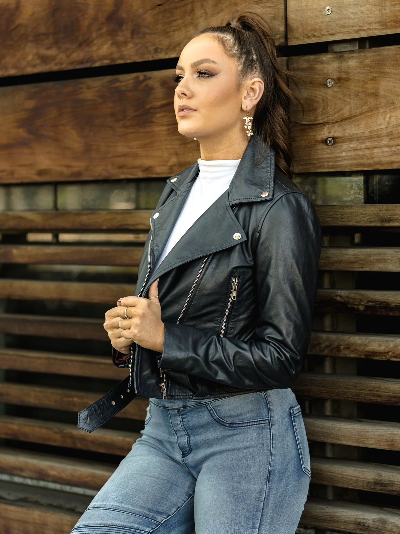 Woman wearing leather crop jacket
