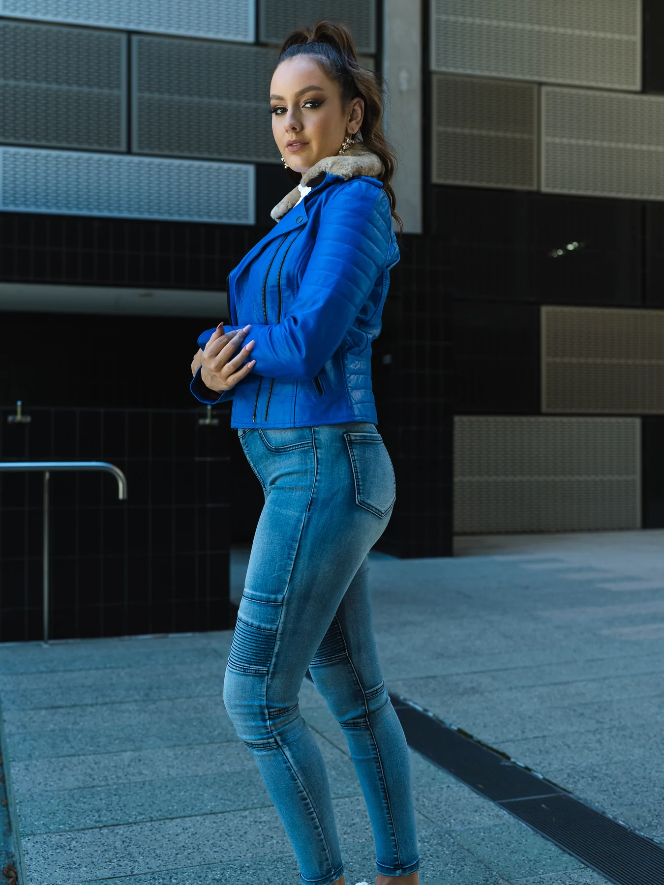 Side look of royal blue leather jacket womens
