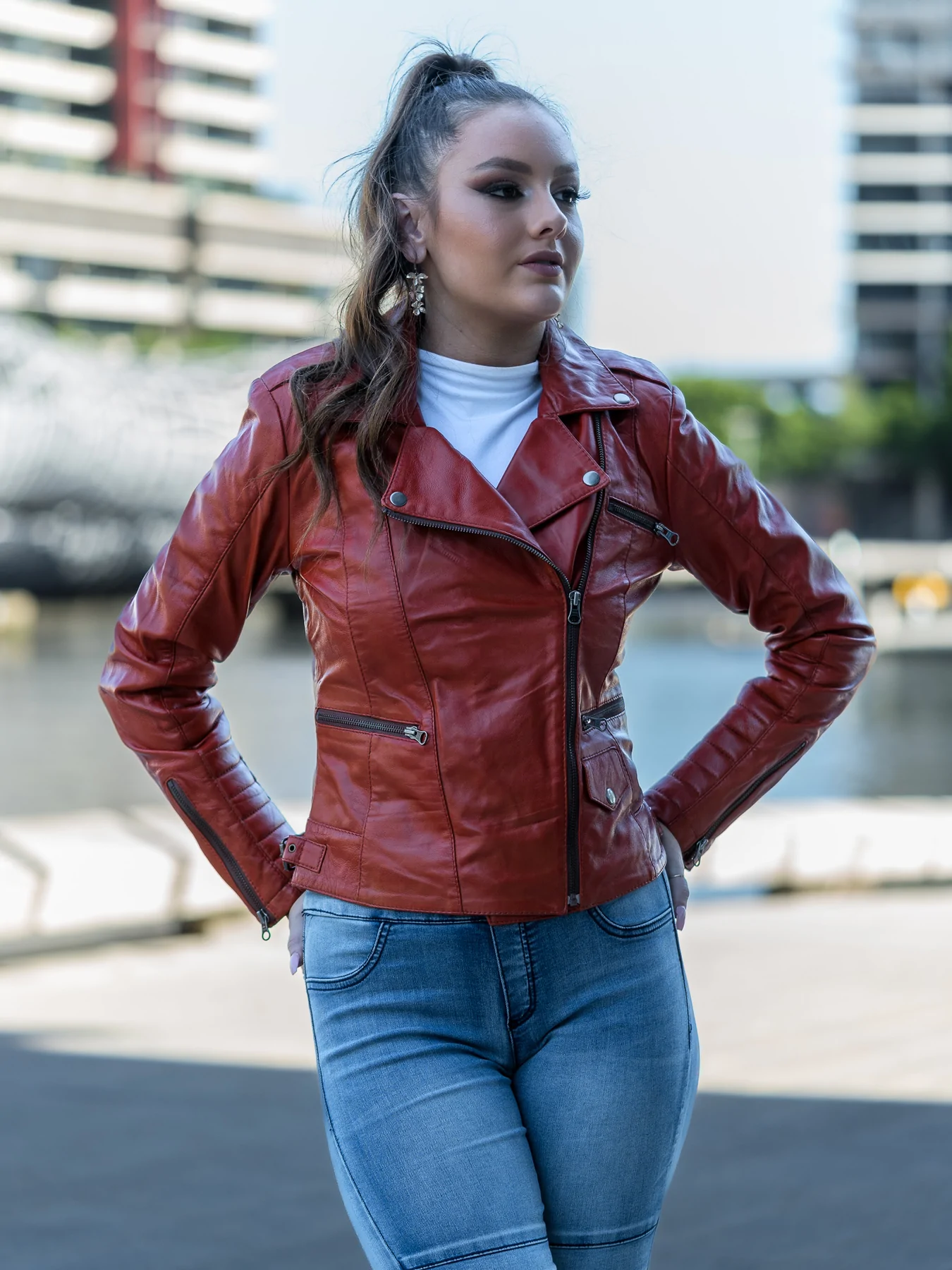 The front zip up look of wine red leather jacket